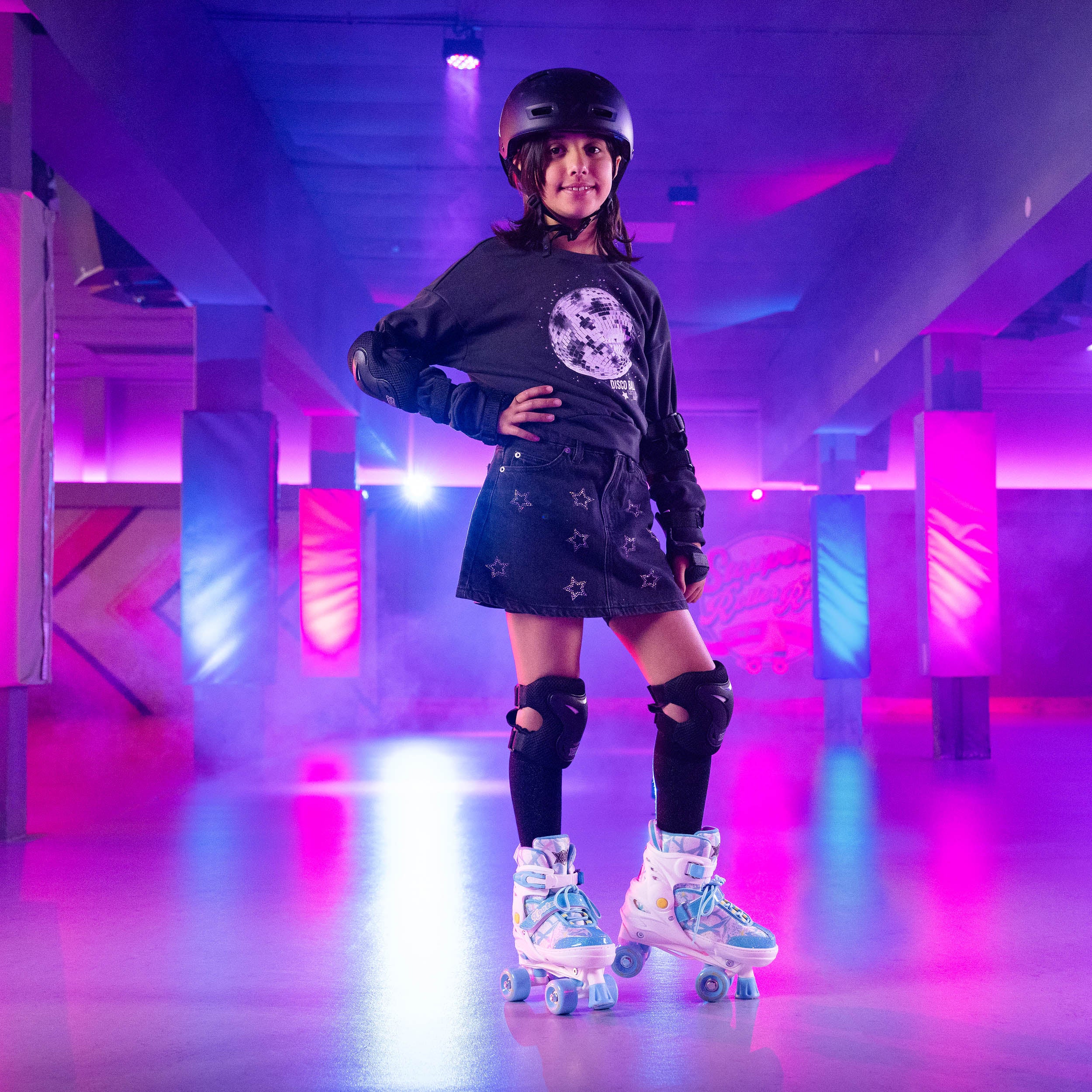 blue glittery quad skates