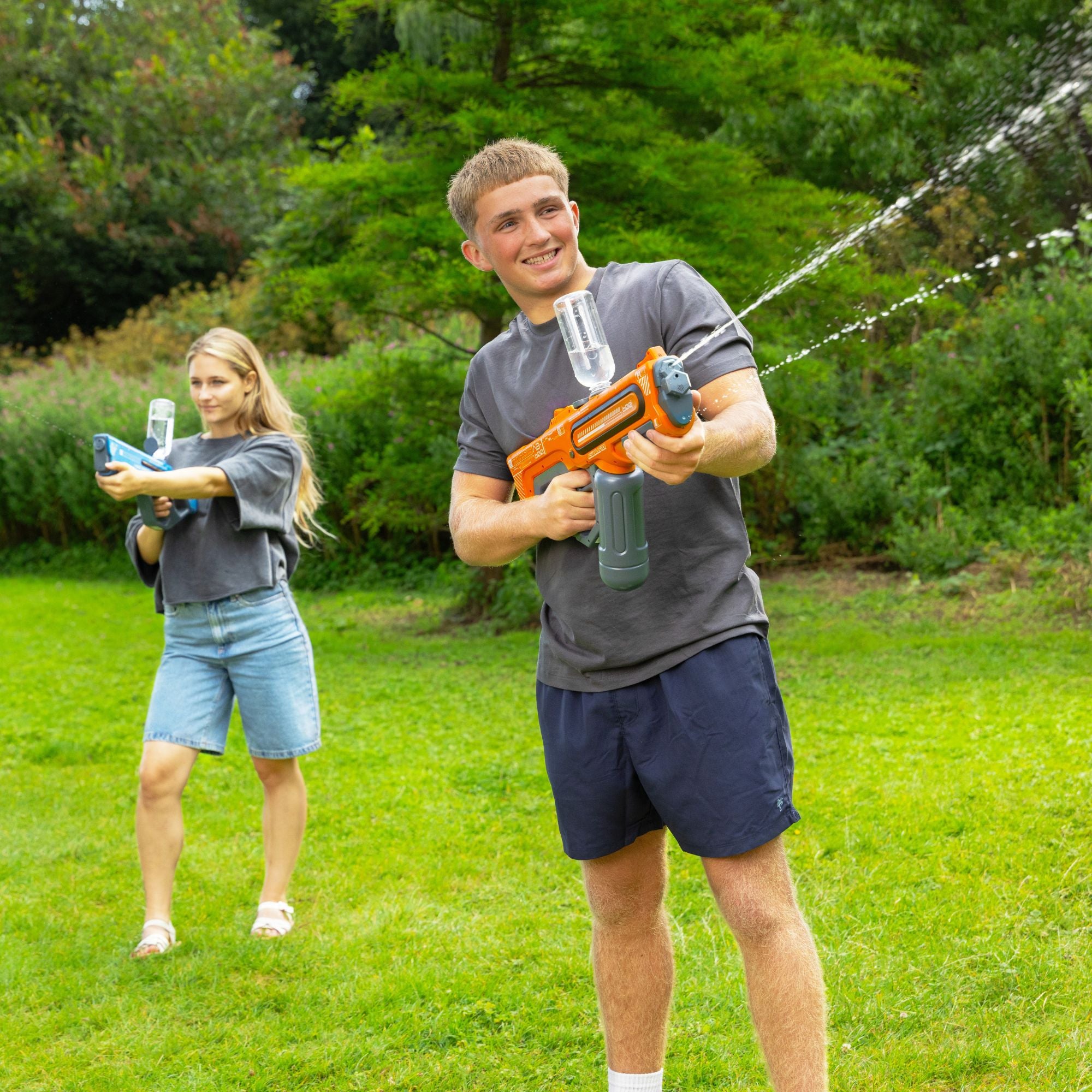 kids playing with water guns
