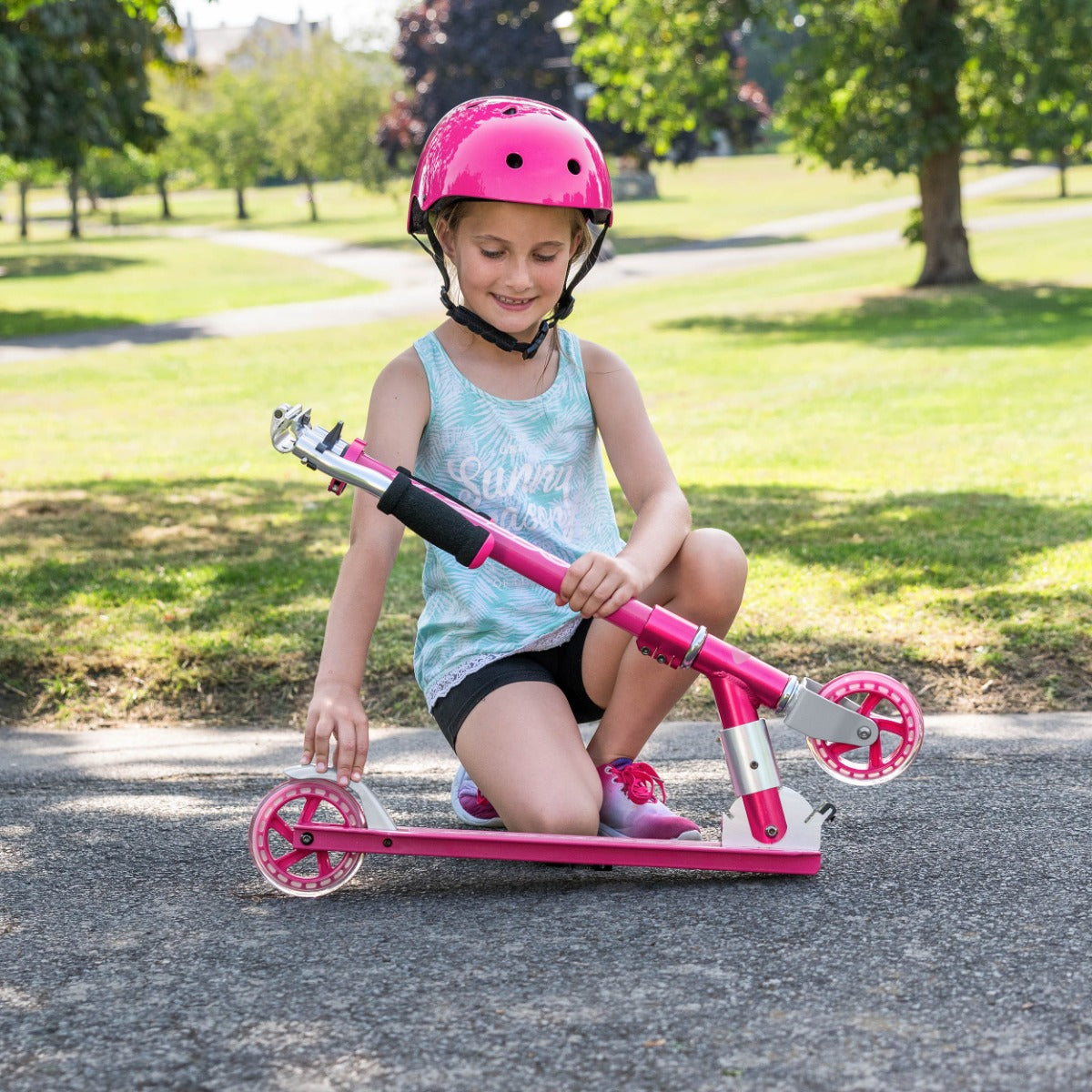 Adjustable height scooter in pink