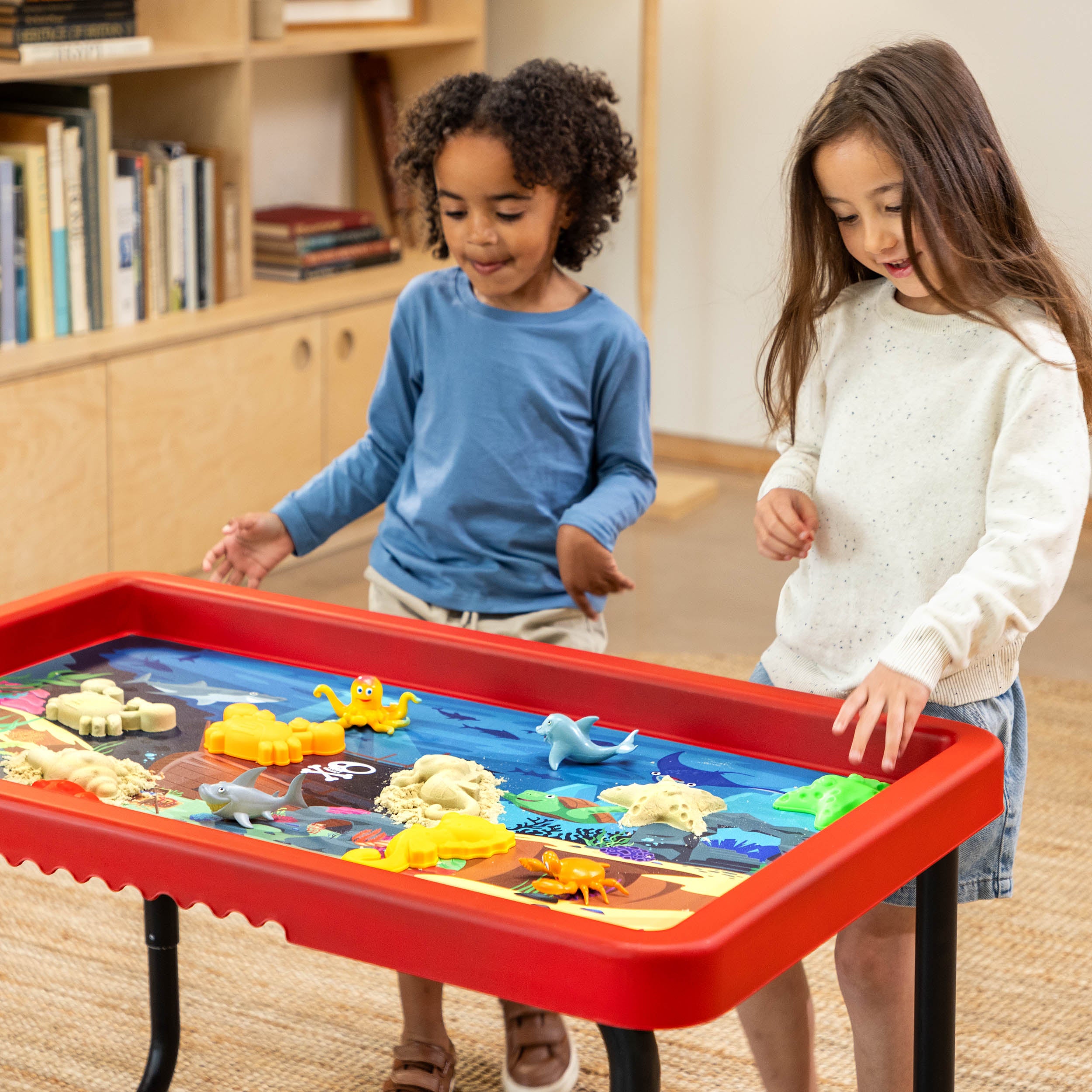 activity table with sea and dino mats