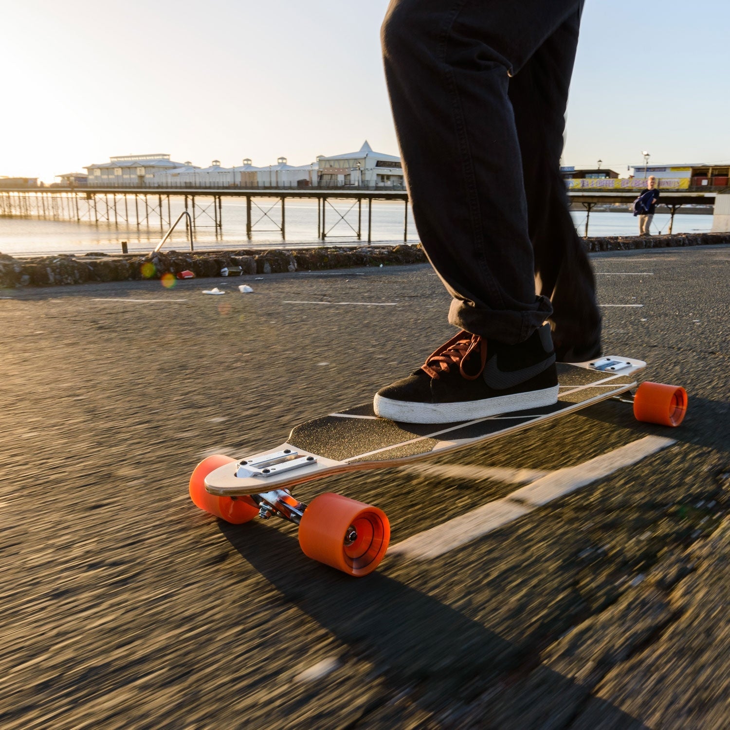 Drop-through longboard for smooth cruising