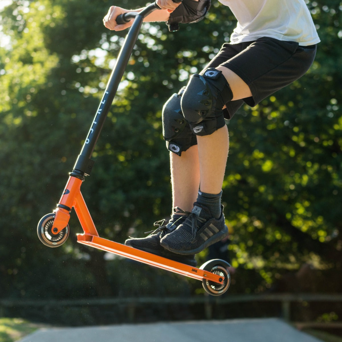 Orange stunt scooter for freestyle riding